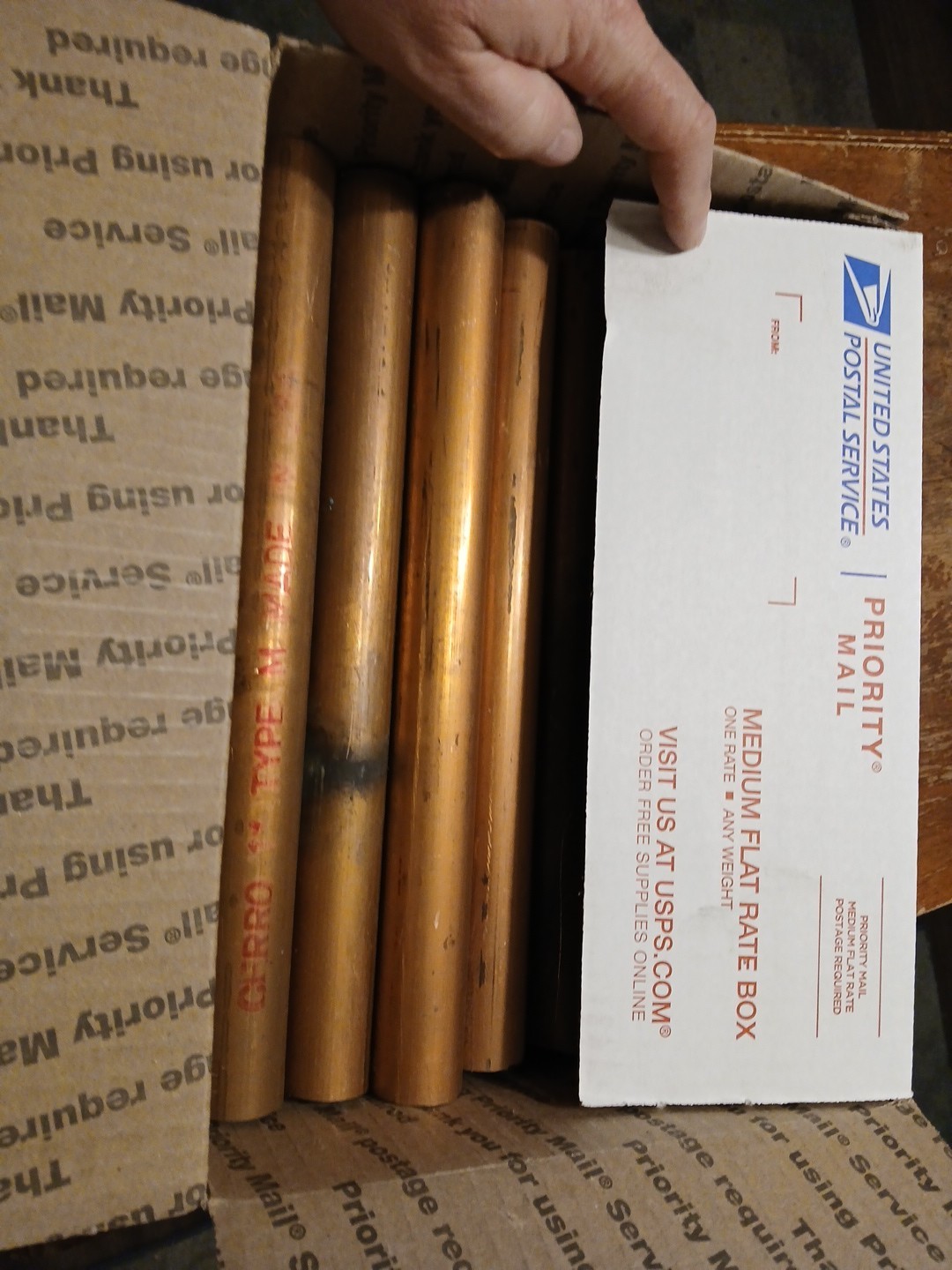 10 pounds of scrap copper Pipe Cut 11″ Long a mixture of 1″ – 2″ pipe.